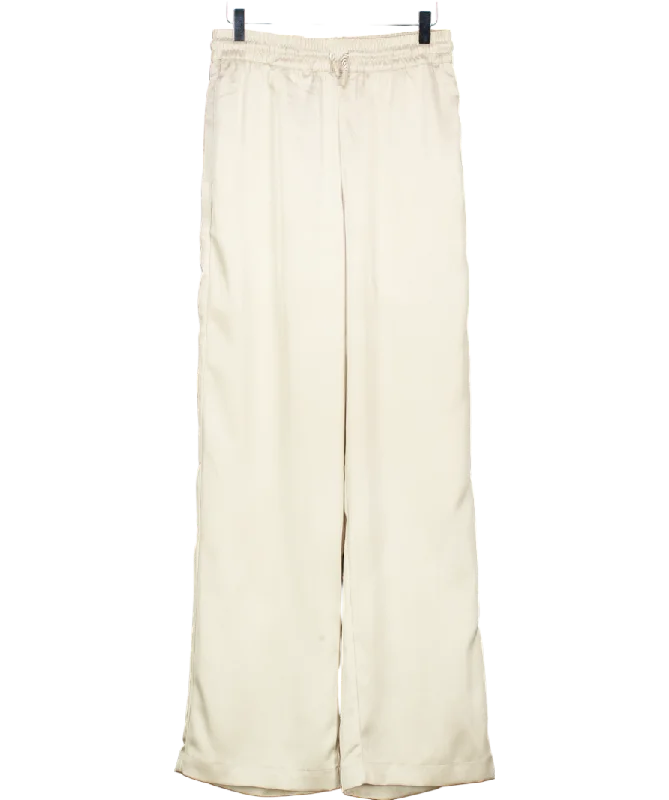 Knit SolidThe Couture Club Beige Satin Emblem Trousers UK 10